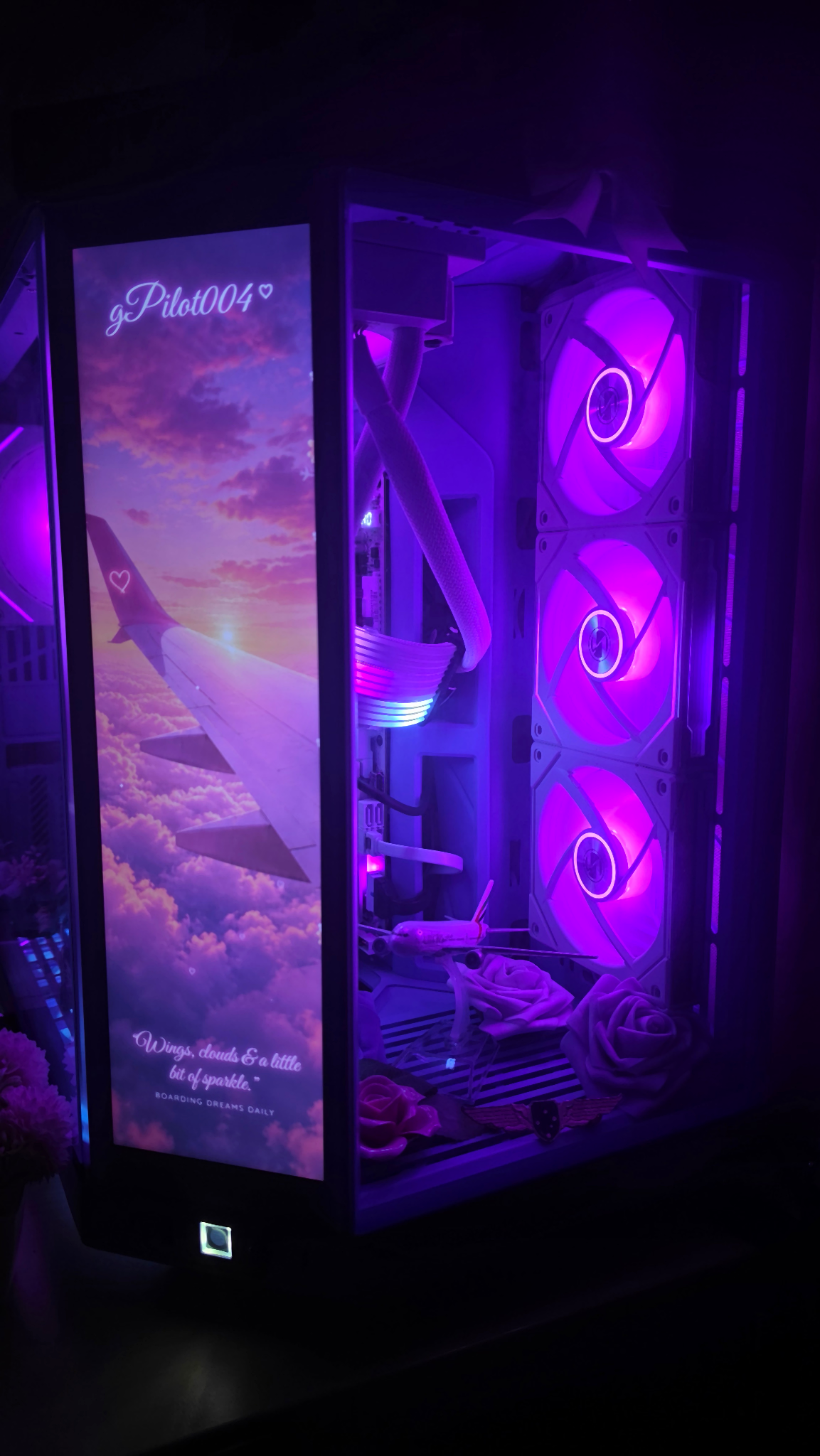 Front-angle view of the gPilot004 HYTE Y70 Touch PC, custom vertical aviation display, RGB fans, aircraft model and roses