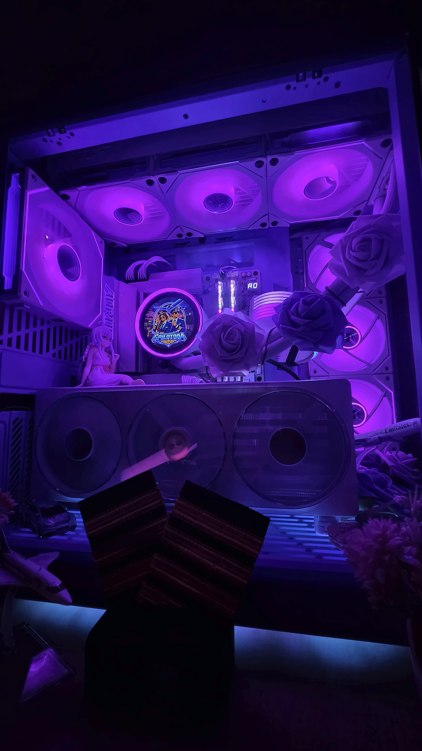 Inside the gPilot004 PC showing the official logo on the NZXT display, RTX 5070, purple fans and roses